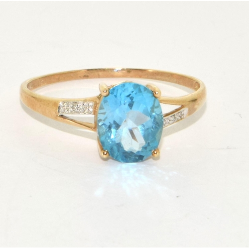 229 - 9ct gold ladies Diamond and Blue Topaz ring size Z