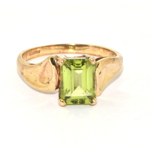 231 - 9ct gold ladies large square set Peridot ring size M