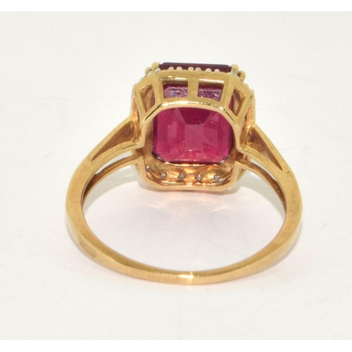 232 - 9ct gold ladies Diamond and Ruby statement ring size R