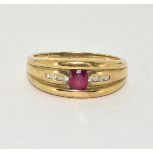 309 - 9ct gold Diamond and Ruby ring size P