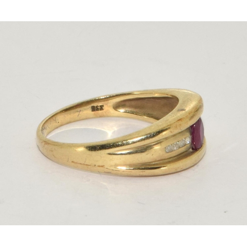 309 - 9ct gold Diamond and Ruby ring size P