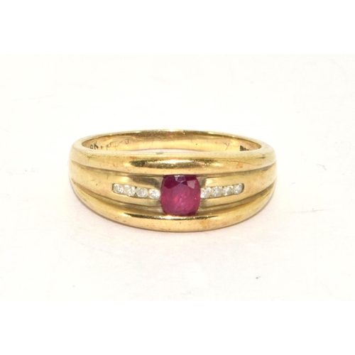 309 - 9ct gold Diamond and Ruby ring size P