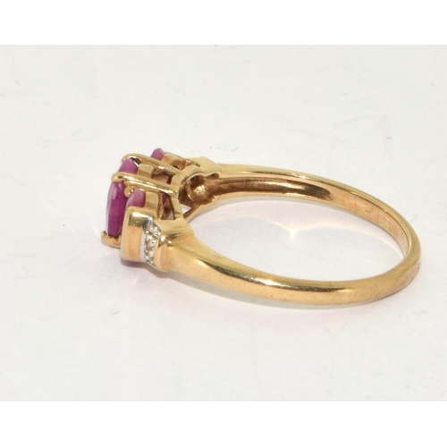 236 - 9ct gold Ladies Diamond and Ruby ring size P