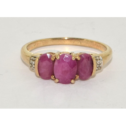 236 - 9ct gold Ladies Diamond and Ruby ring size P