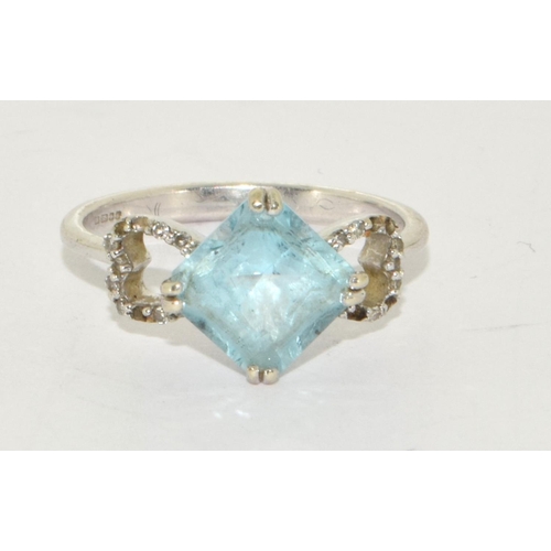 237 - 9ct white gold ladies Diamond and Aquamarine ring size N