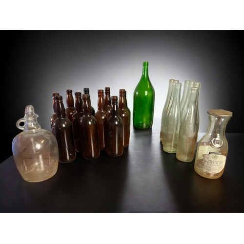 435 - A COLLECTION OF VINTAGE WINE BOTTLES ETC.