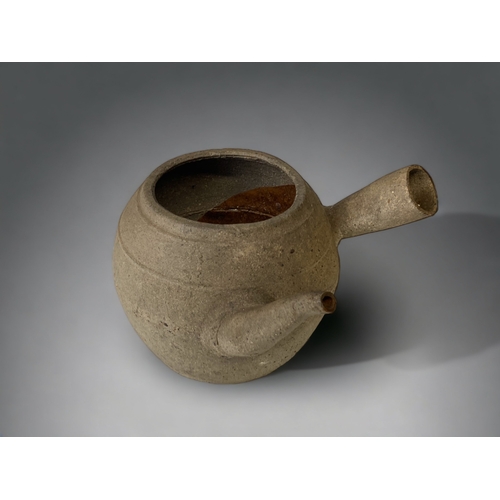 288 - AN UNUSUAL JAPANESE POTTERY KYUSU 'WABI-SABI' TEAPOT. WITH OFFSET 'CROOKED' SPOUT & HANDLE.
12 X 21C... 