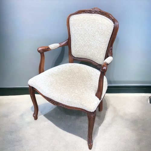 37 - A PAIR OF CARVED ROSEWOOD CARVER CHAIRS. UPHOLSTERED IN A CHAMPAGNE PATTERN VELVET. CARVED FOLIATE D... 