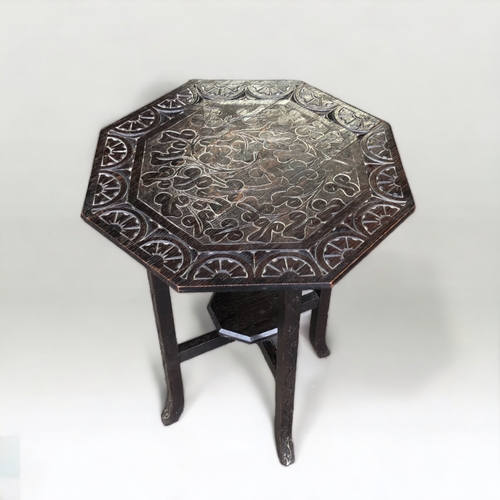 42 - A 19TH CENTURY CARVED OAK GOTHIC DROP-LEAF SIDE TABLE. 
HEIGHT - 59.5CM