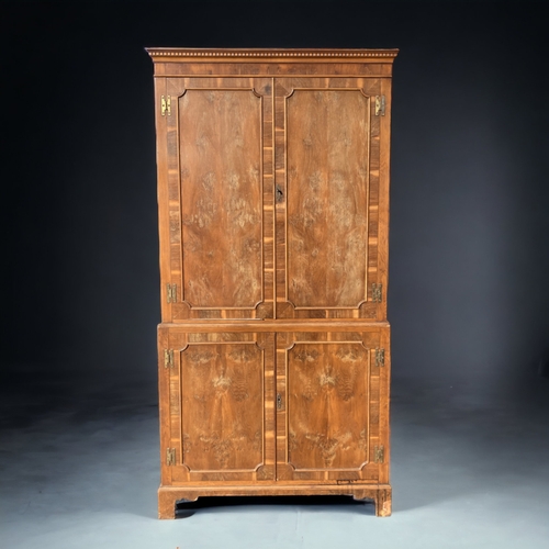 43 - A BURR YEW WOOD COCKTAIL CABINET.