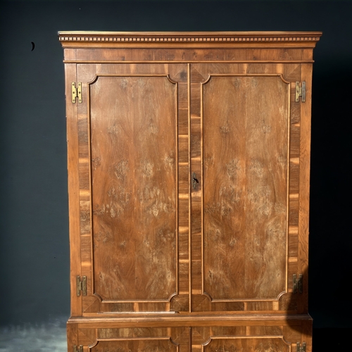 43 - A BURR YEW WOOD COCKTAIL CABINET.