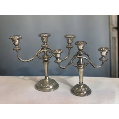 459 - TWO VINTAGE SILVER PLATE CANDELABRA.
TALLEST - 28CM