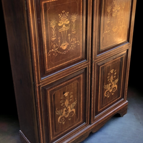 54 - A VICTORIAN INLAID MAHOGANY DOUBLE WARDROBE. WITH FINE INLAID MARQUETRY TO DOORS.