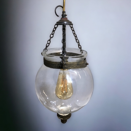 486 - A GLASS GLOBE SHAPE CEILING LIGHT.