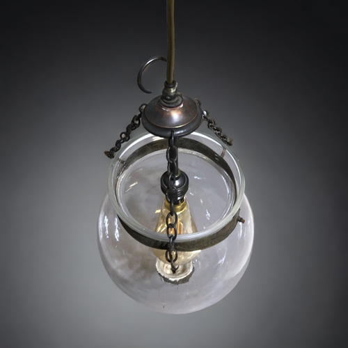 486 - A GLASS GLOBE SHAPE CEILING LIGHT.