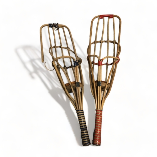 535 - PAIR OF VINTAGE TAKRAW BATS.