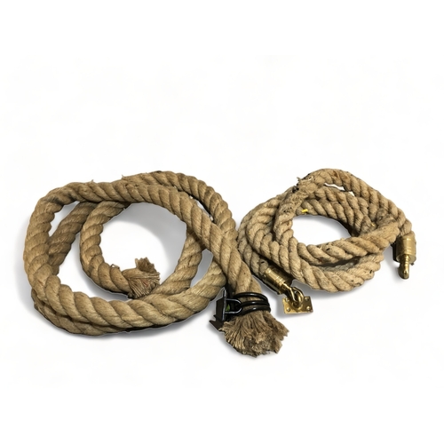 487 - TWO LENGTHS OF THICK HEMP BANNISTER ROPES.