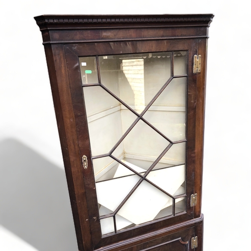 63 - A 19TH CENTURY MAHOGANY GLAZED CORNER CABINET.