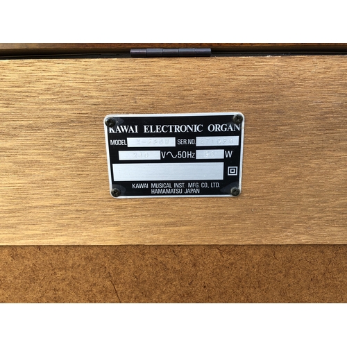 69 - A KAWAI ELECTRONIC ORGAN & STOOL.