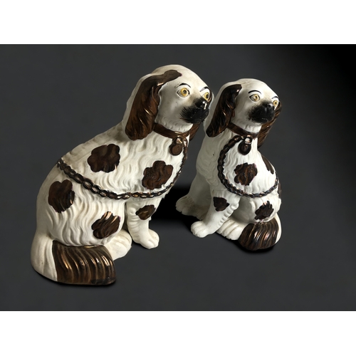 497 - A PAIR OF LARGE STAFFORDSHIRE DOGS