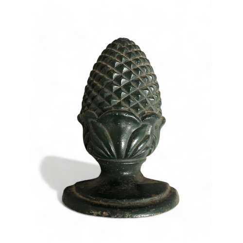 148 - A LARGE CAST DOOR STOP ACORN AND 3 LARGE BRASS DECORATIVE KITCHENWARE