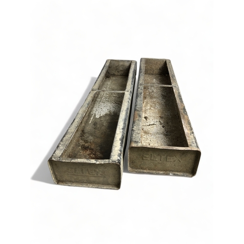 104 - TWO LARGE GALVANISED FEEDING TROUGHS / PLANTERS