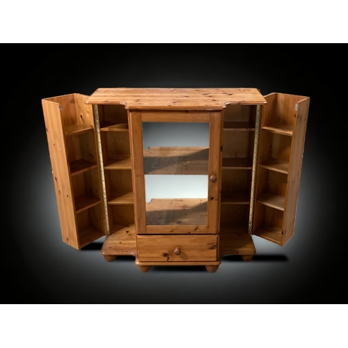 552 - A PINE MUSIC CABINET.