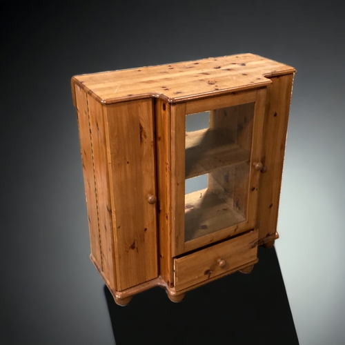 552 - A PINE MUSIC CABINET.