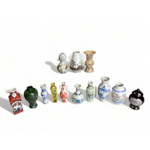 280 - A COLLECTION OF 13 CHINESE AND JAPANESE MINITURE VASES