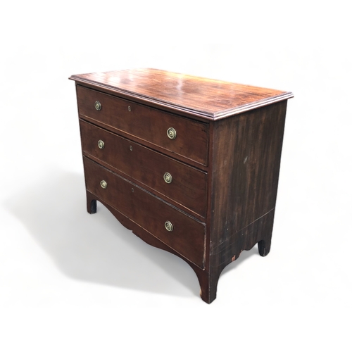 53 - A 19TH CENTURY REGENCY MAHOGANY CHEST OF DRAWERS. 
THREE GRADUATING DRAWERS, RAISED ON SHAPED LEGS.