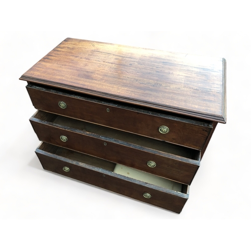 53 - A 19TH CENTURY REGENCY MAHOGANY CHEST OF DRAWERS. 
THREE GRADUATING DRAWERS, RAISED ON SHAPED LEGS.