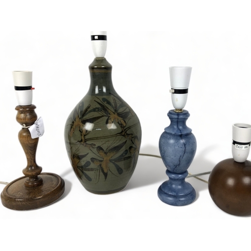 42 - FOUR VINTAGE TABLE LAMPS. INCLUDING STUDIO POTTERY AND WOODEN EXAMPLES.