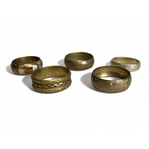 268 - A collection of eight vintage Tibetan & others bangles & bracelets. Including metal mounted wood & b... 