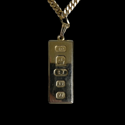 273 - A 22Ct gold plated Ingot necklace pendant.