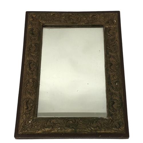 65 - A Gilt plaster wall mirror, together with an Oval wall mirror.