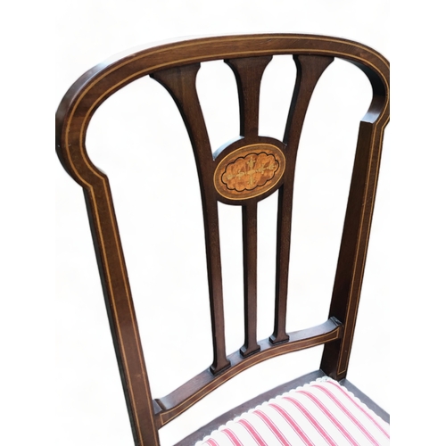 66 - A vintage Mahogany inlaid dining chair.