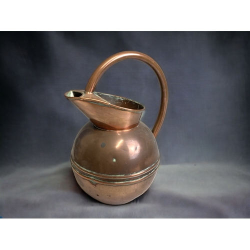 543 - TWO 19TH CENTURY CHRISTOPHER DRESSER ATTRIBUTED COPPER WATER JUGS. BY HENRY LOVERIDGE.  CIRCA 1885. ... 