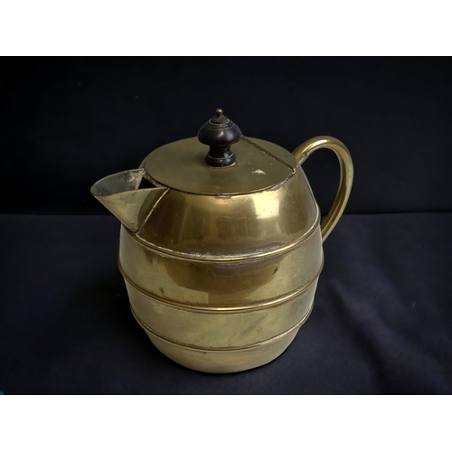 546 - A CHRISTOPHER DRESSER FOR HENRY LOVERIDGE & CO BRASS JUG. CIRCA 1890.
HEIGHT - 15CM 
(SEE HARRY LYON... 