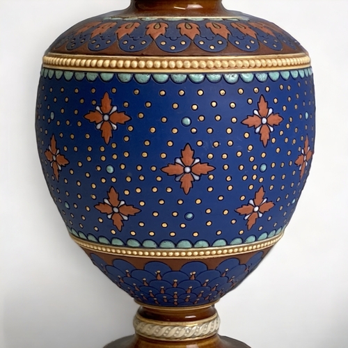 550 - A 19TH CENTURY VILLEROY & BOCH METTLACH VASE. STYLISED DESIGNS, IN THE CHRISTOPHER DRESSER MANNER.
H... 