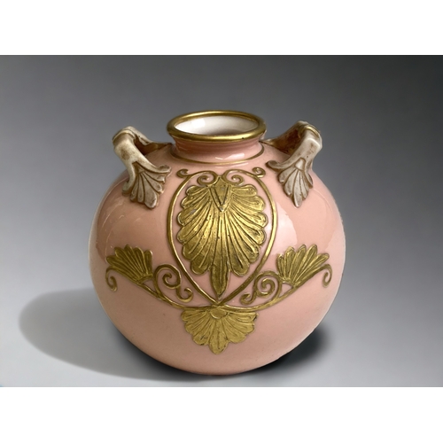 554 - A 19TH CENTURY PORCELAIN GLOBULAR FORM VASE. BABY PINK GROUND WITH GILT OVERLAY DESIGN. 
HEIGHT - 10... 