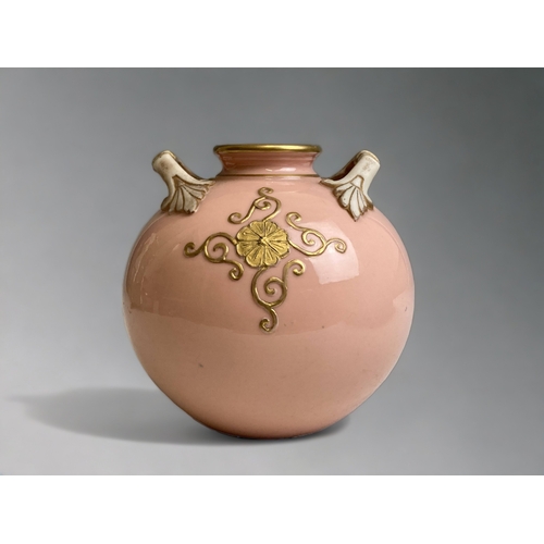 554 - A 19TH CENTURY PORCELAIN GLOBULAR FORM VASE. BABY PINK GROUND WITH GILT OVERLAY DESIGN. 
HEIGHT - 10... 