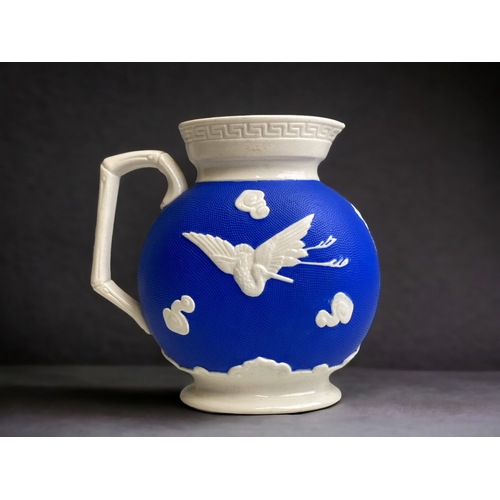 557 - A CHRISTOPHER DRESSER DESIGN FOR W. BROWNFIELD STONEWARE 'YEDDO' JUG. 
CIRCA 1876.
HEIGHT - 15CM