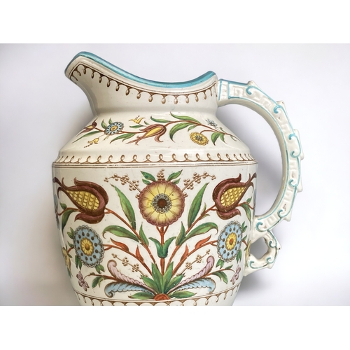 562 - A VICTORIAN OLD HALL EWER. CAIRO PATTERN, ATTRIBUTED TO CHRISTOPHER DRESSER.
CIRCA 1884.
HEIGHT - 31... 