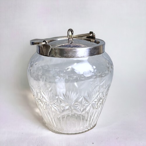 564 - A VICTORIAN CUT GLASS & SILVER PLATE BISCUIT BARREL. JOHN GRINSELL 1879-90.
HEIGHT - 15CM