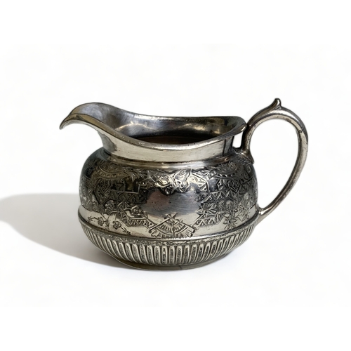 566 - A VICTORIAN SILVER PLATE TRAY AND MILK JUG. DECORATED WITH CHRISTOPHER DRESSER TYPE 'JAPONESQUE' DES... 