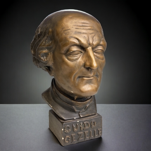 534 - A PAINTED PLASTER BUST OF GUIDO GEZELLE.
EARLY 20TH CENTURY.
PAINTED BRONZE EFFECT.
HEIGHT - 32CM