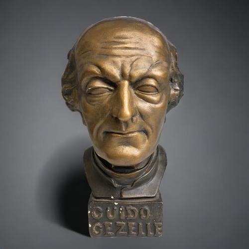 534 - A PAINTED PLASTER BUST OF GUIDO GEZELLE.
EARLY 20TH CENTURY.
PAINTED BRONZE EFFECT.
HEIGHT - 32CM