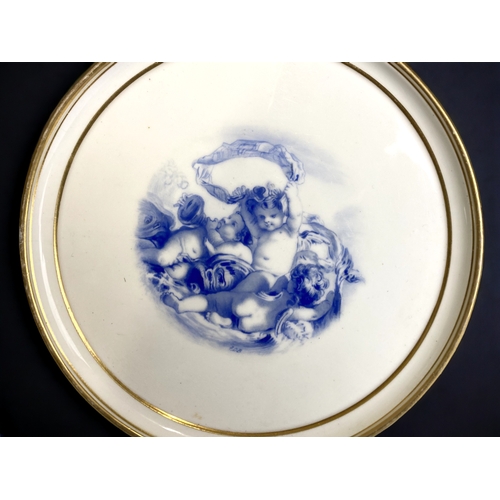 535 - An 1865 Minton porcelain plaque. Decorated in blue Boullemier style Cherubs at play. Artist monogram... 