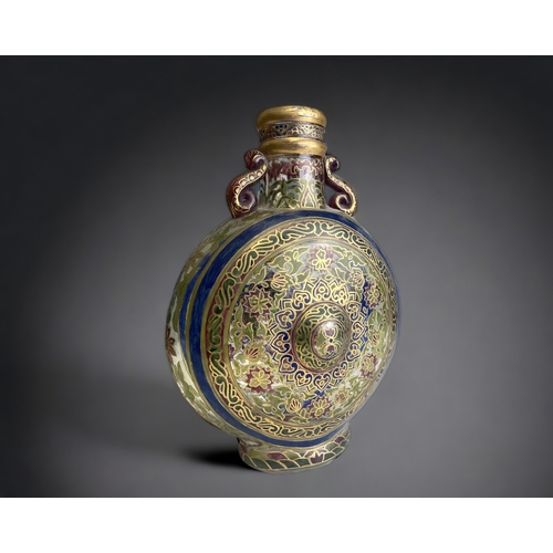 616 - A signed Fritz Heckert glass moon bottle flask.
Enamel painted Persian design. 
Circa 1900
Signed FH... 