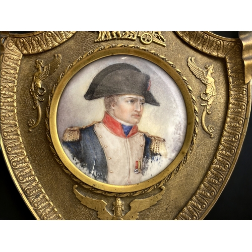 652 - A 19th Century French 'Grand Tour' Napoleon portrait in Ormolu frame. It is watercolour on a thin pi... 